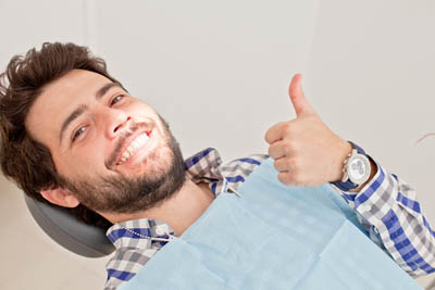 man laying back in the dental chair at Afdent in Fort Wayne, IN