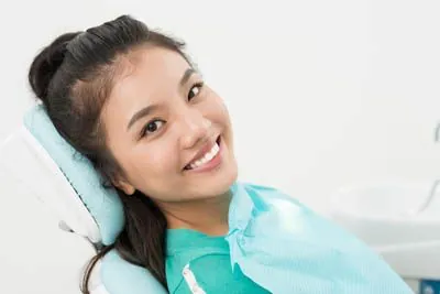 woman smiling during her first dental appointment at Afdent in Fort Wayne, IN